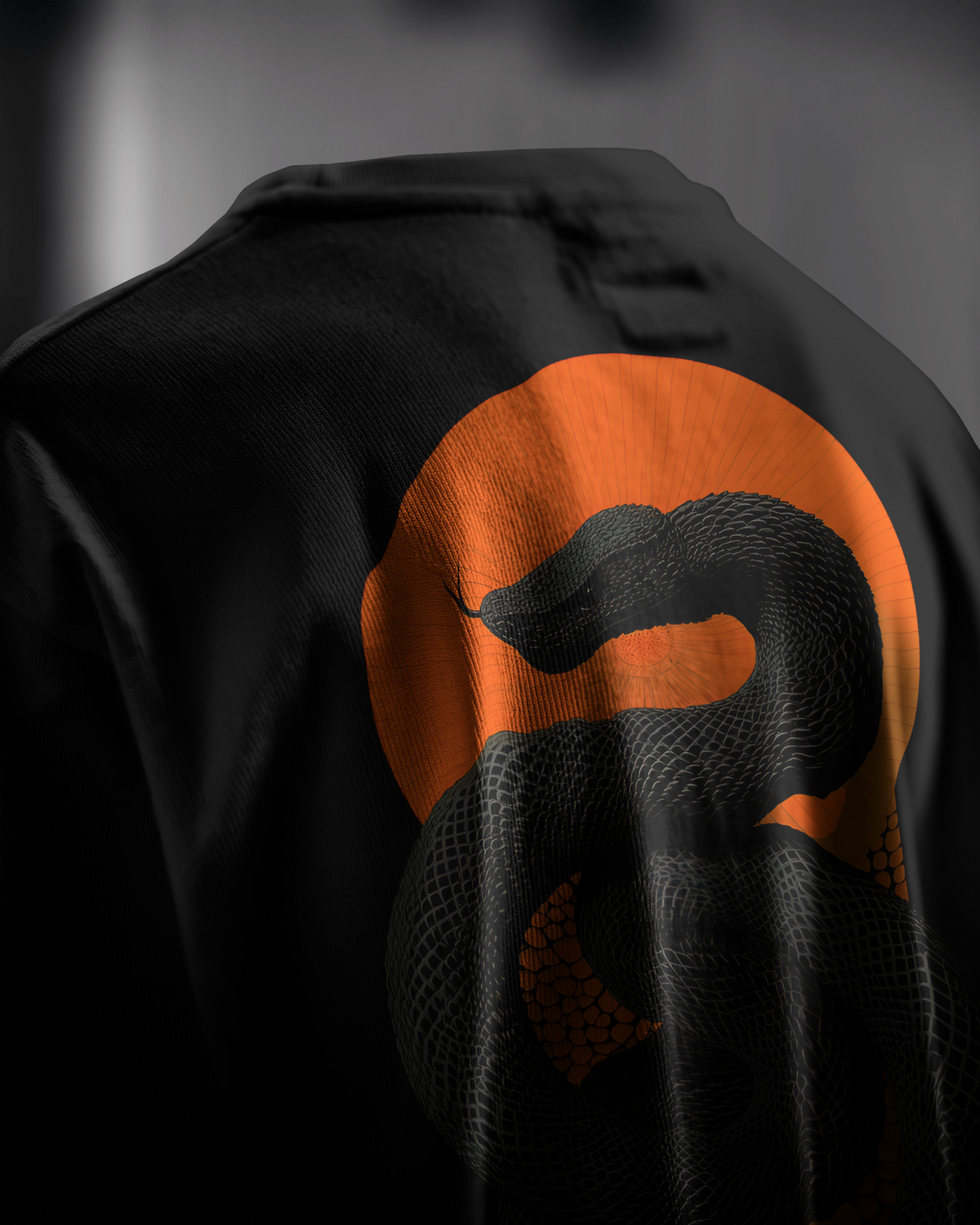 Venomous Sunset, back view, closeup, black color, oversized t-shirt, graphic printed t-shirt.