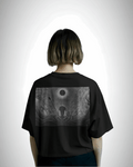 Berserk Eclipse Requeim, back view, black color, girl wearing, oversized t-shirt, graphic printed t-shirt.