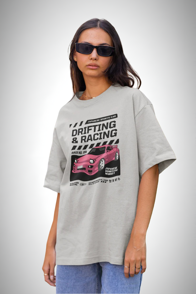Drift Edition RX7, grey color, front side, girl with glasses wearing, oversized graphic printed t-shirt.