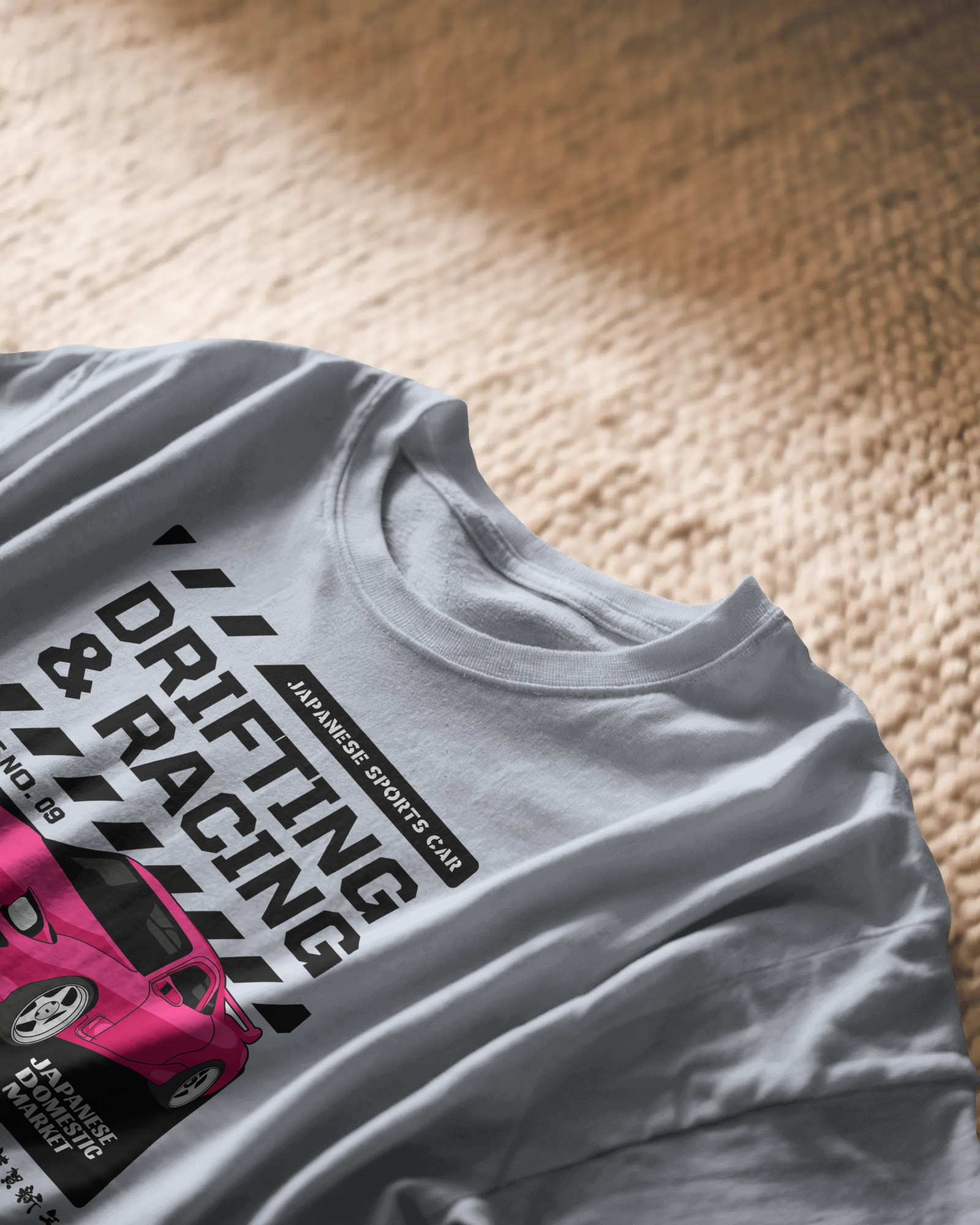 Drift Edition RX7, grey color, front side, on carpet, oversized graphic printed t-shirt.