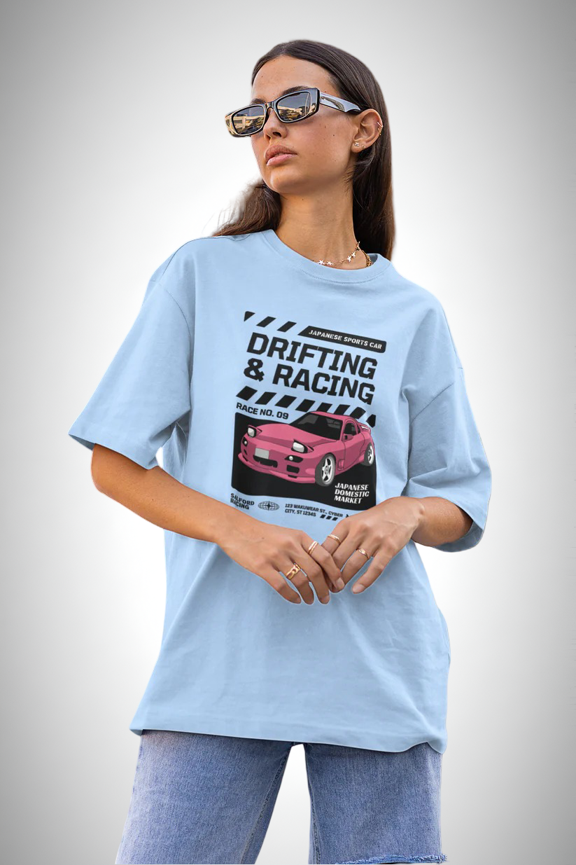 Drift Edition RX7, blue color, front side, girl with glasses wearing, oversized graphic printed t-shirt.