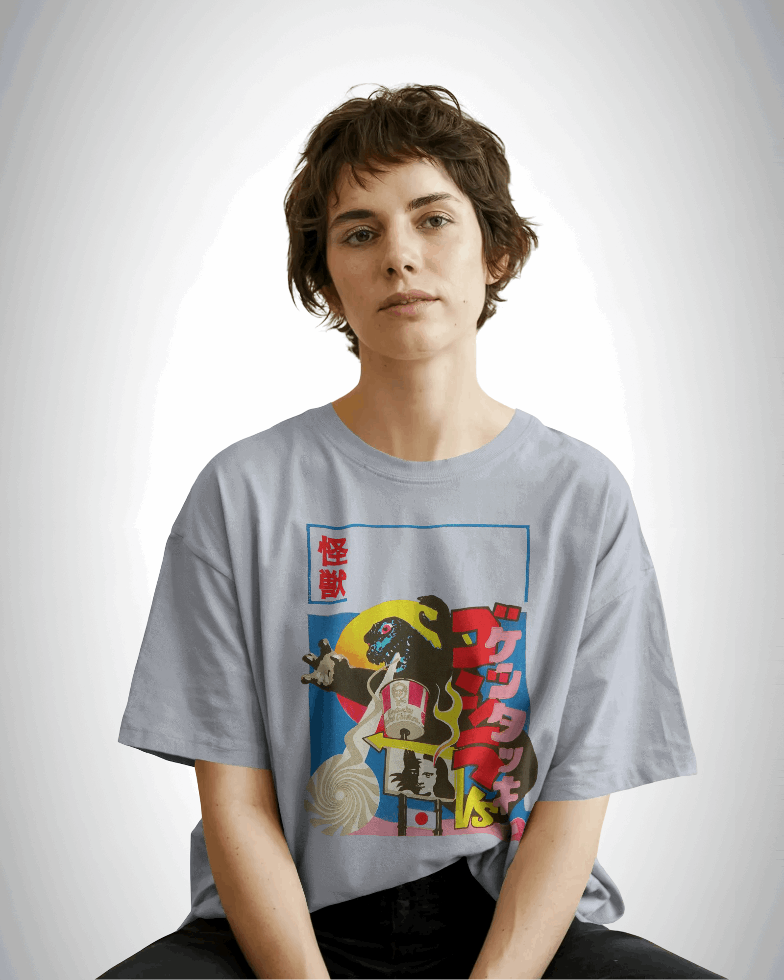 kaiju kravings, grey color, front side, girl wearing, oversized graphic printed t-shirt.