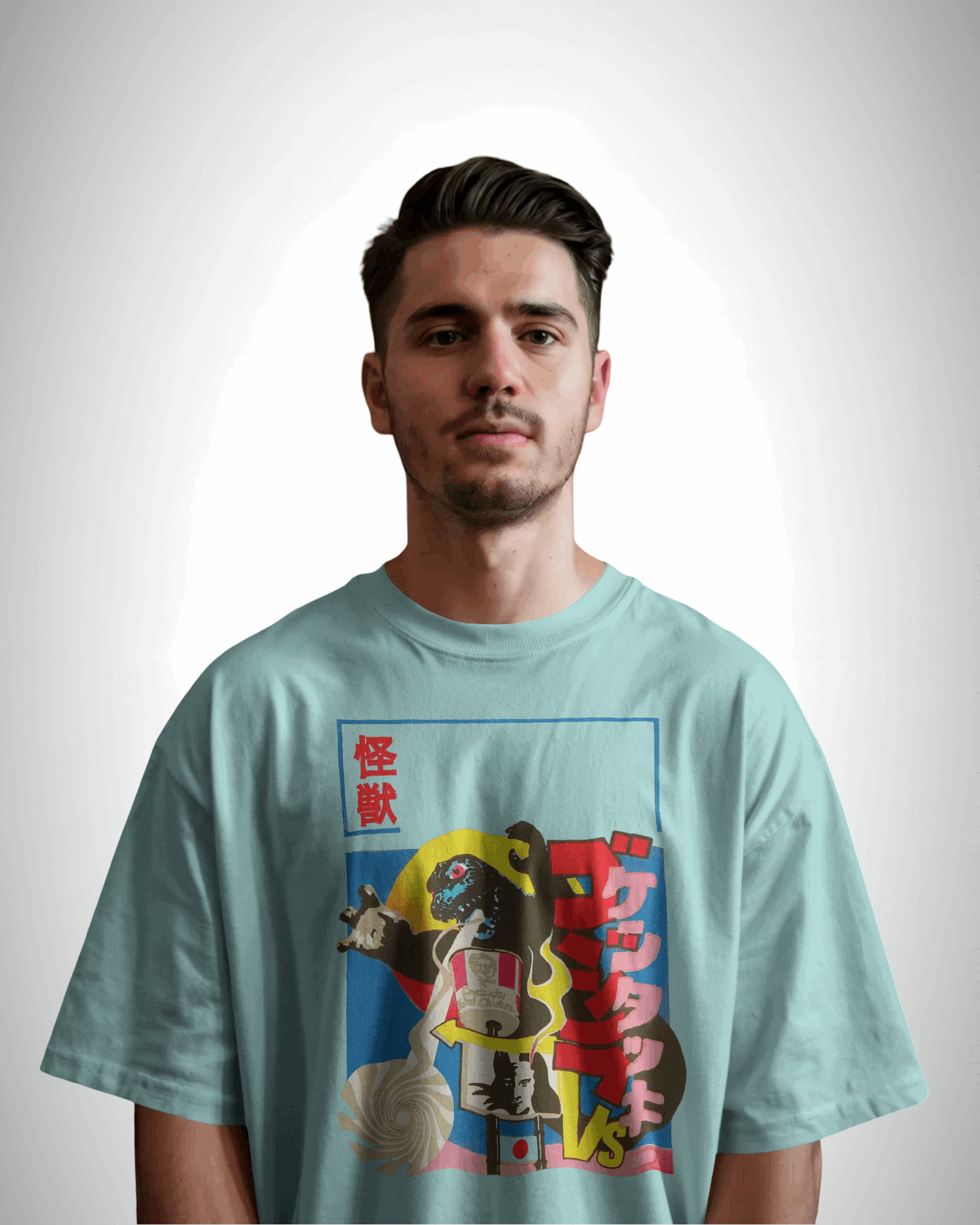 kaiju kravings, mint color, front side, man wearingoversized graphic printed t-shirt.