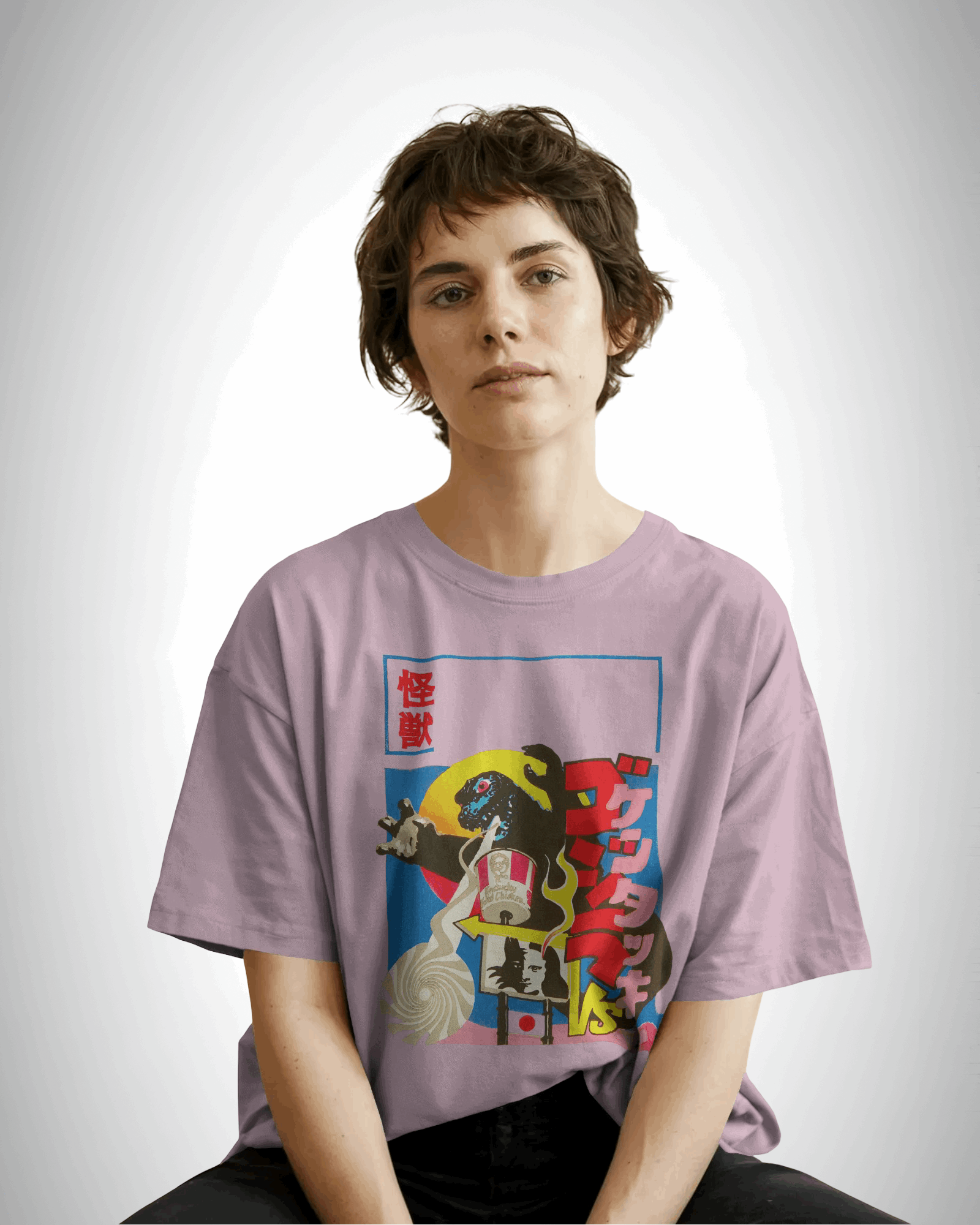 kaiju kravings, baby pink color, front side, girl wearing, oversized graphic printed t-shirt.