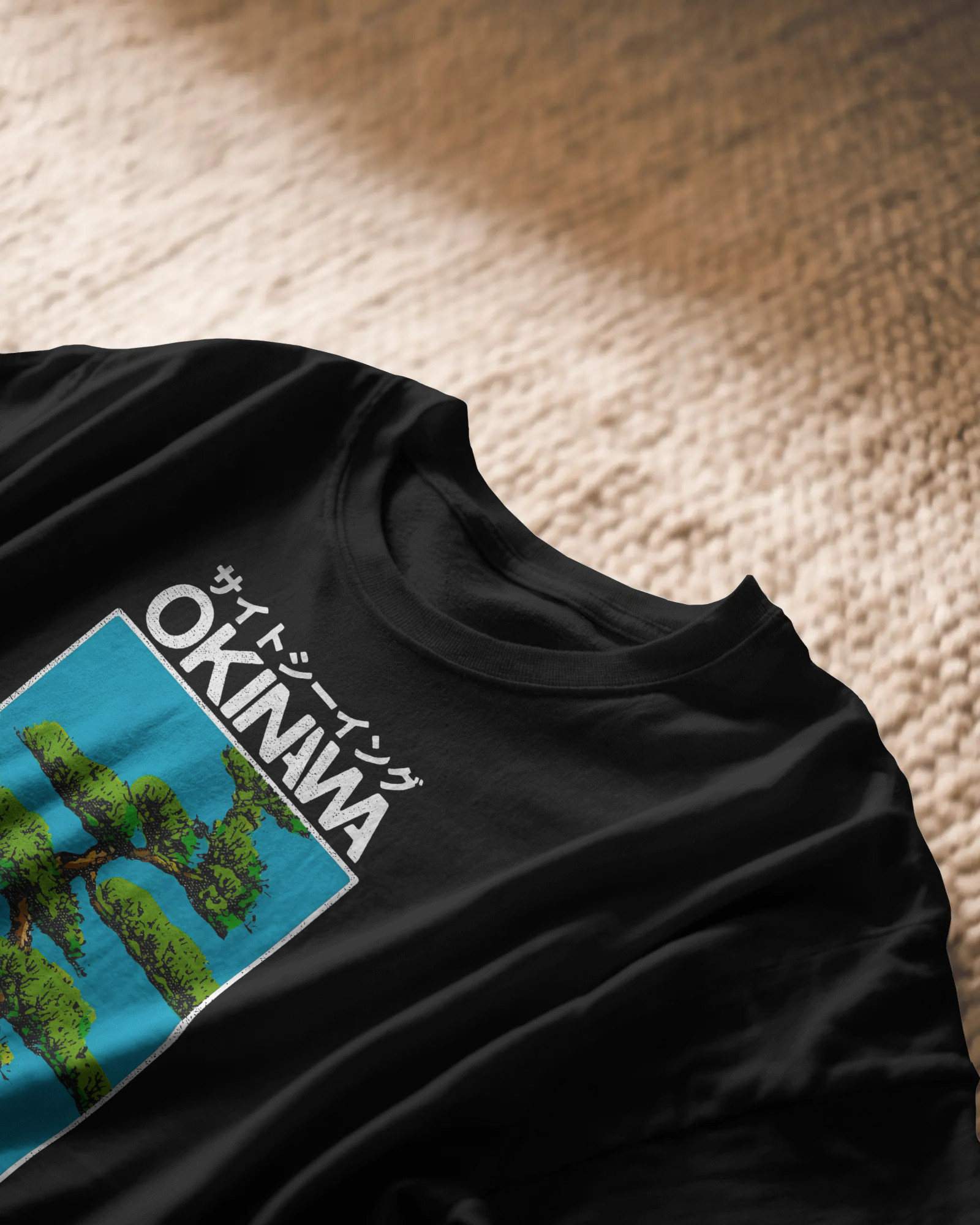 Okinawa Pines, black color, front side,  closeup on carpet, oversized graphic printed t-shirt.