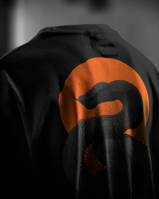 Venomous Sunset, back view, closeup, black color, oversized t-shirt, graphic printed t-shirt.